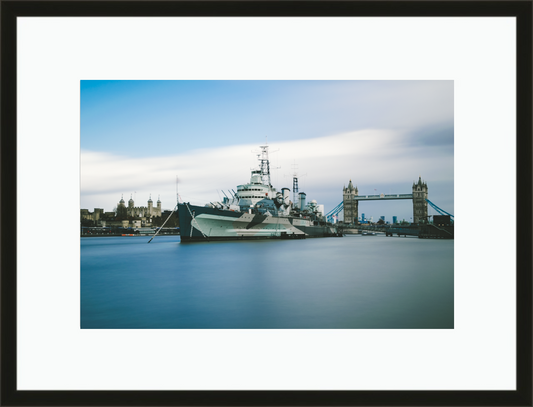 Framed and mounted photograph of hms belfast battleship on the river thames on southbank in the city of london